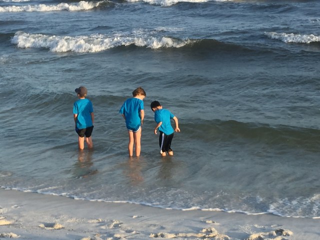 Kids playing in the Ocean